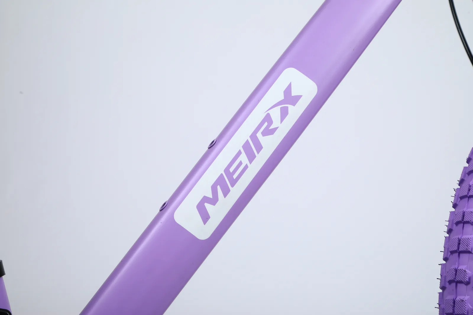 MEIRX candy-purple frame with custom decal close-up